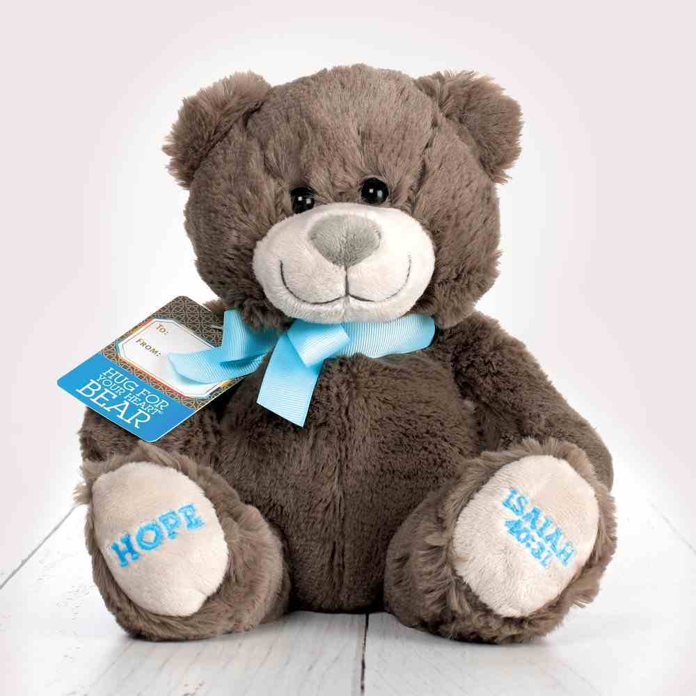 teddy bear with blue ribbon